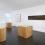 Installation view: Three new buildings, a fence and a factory.